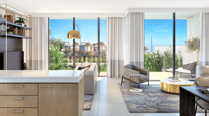 Luxueux et moderne appartement décloisonné dans les collines de Dubaï, s'étendant harmonieusement jusqu'à un patio extérieur avec une vue sur le jardin luxuriant, doté d'un mobilier élégant et d'une lumière naturelle abondante.