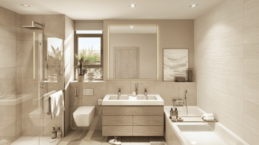 Intérieur de salle de bains moderne avec lavabo mural, vanité en bois, grand miroir, baignoire Al Furjan et vue sur la verdure à travers une fenêtre. Tons neutres et design épuré.