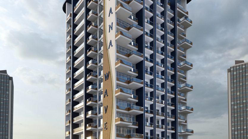 Un immeuble moderne de grande hauteur à Dubaï avec une façade ondulée unique, intitulée « Samana Waves », sur un ciel nuageux pendant la journée. La structure présente des fenêtres en verre bleu et des accents blancs.