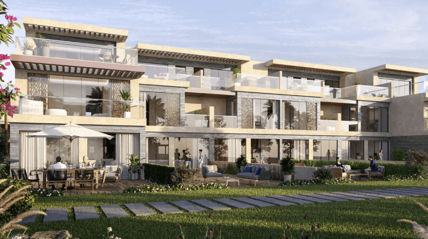 Luxueuses villas résidentielles modernes à Dubaï avec balcons et terrasses, dotées de grandes fenêtres en verre et de finitions en pierre naturelle. Les gens socialisent dans des jardins paysagers luxuriants au premier plan.