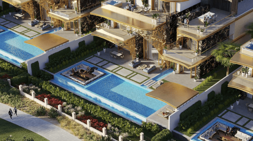 Vue aérienne d'un complexe luxueux doté de piscines sur le toit, de jardins paysagers et de cabanes privées à Dubaï, où les gens profitent tranquillement des commodités.