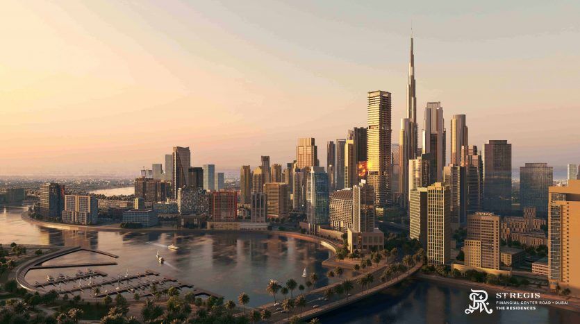 A panoramic view of Dubai's bustling skyline at sunset, showing towering skyscrapers, a winding river and reflections on the water.
