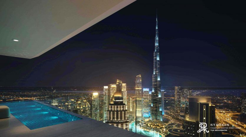 A night view from a high-rise apartment in Dubai with an infinity pool overlooking a cityscape including the illuminated Burj Khalifa and surrounding skyscrapers.