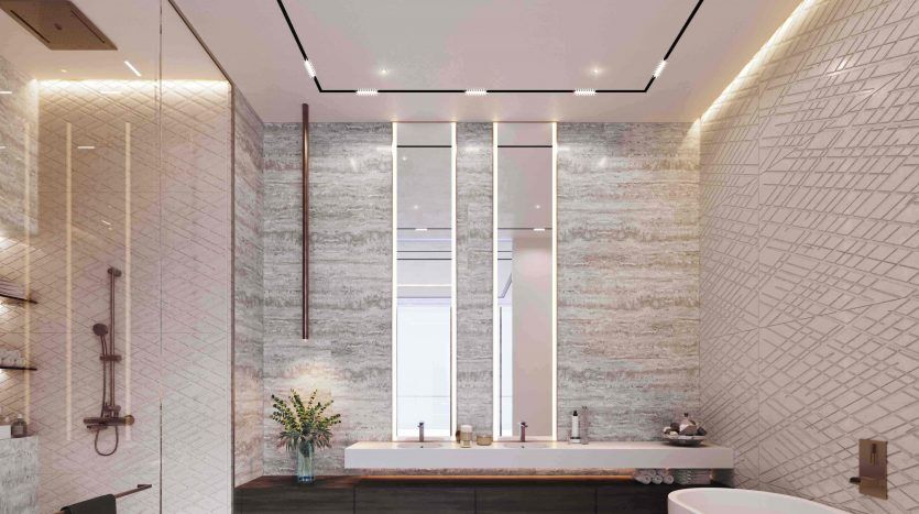 A modern bathroom in a Dubai villa with marble walls, a large bathtub, a wooden vanity with two basins and a spacious shower area, lit by natural light and recessed ceiling lights.