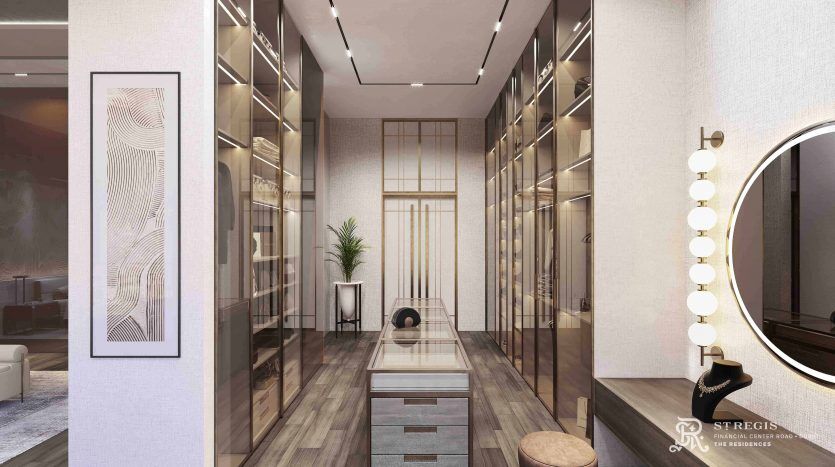 A luxurious dressing room in a Dubai Villa, with elegant parquet flooring, lined with sleek white cabinetry, featuring a glass-topped center island, full-length mirror and modern fixtures.