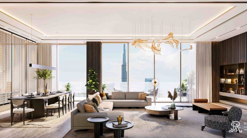 Luxurious living room in a Dubai apartment with modern decor, featuring a sofa set, dining area and large window with ocean views. Ambient lighting and wood accents add warmth.