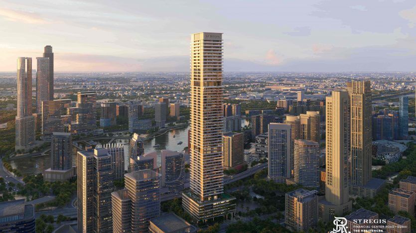 Aerial view of a modern cityscape at sunset, highlighted by numerous high-rise buildings near a winding river, with lush greenery and luxurious Dubai villas interspersed.