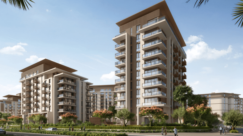 Digital rendering of modern apartment buildings in Dubai with beige facades surrounded by palm trees under a clear blue sky. A carefully landscaped pedestrian walkway is visible in the foreground.