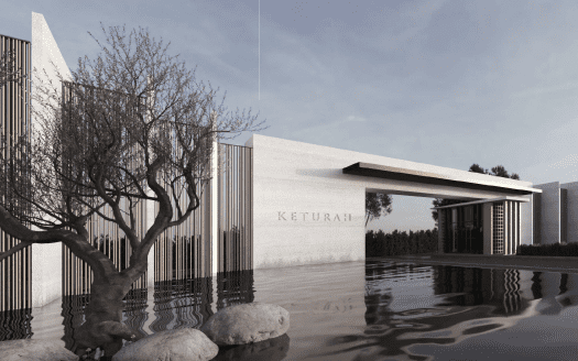 Conception architecturale moderne avec un bâtiment portant le nom « Keturah » sur sa façade, entouré d'eau, d'arbres dénudés et de grosses pierres, reflétant une esthétique tranquille et élégante dans une villa de premier ordre à Dubaï.
