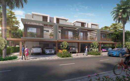 Maisons mitoyennes modernes à Dubaï avec parking couvert, balcons élégants et aménagement paysager luxuriant. Personnes et véhicules visibles, avec un éclairage diurne lumineux.