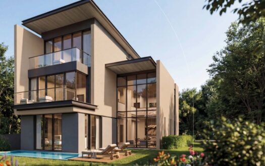 Maison moderne de trois étages à The Orchard by Sobha, avec de grandes baies vitrées et des balcons, entourée d'une végétation luxuriante et d'une pelouse bien entretenue, avec une petite piscine et des chaises longues dans l'arrière-cour par temps ensoleillé.