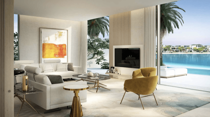 A luxurious living room with white sofa, mustard yellow armchair and modern decor in a Dubai apartment, overlooking a calm blue lake through sliding glass doors.