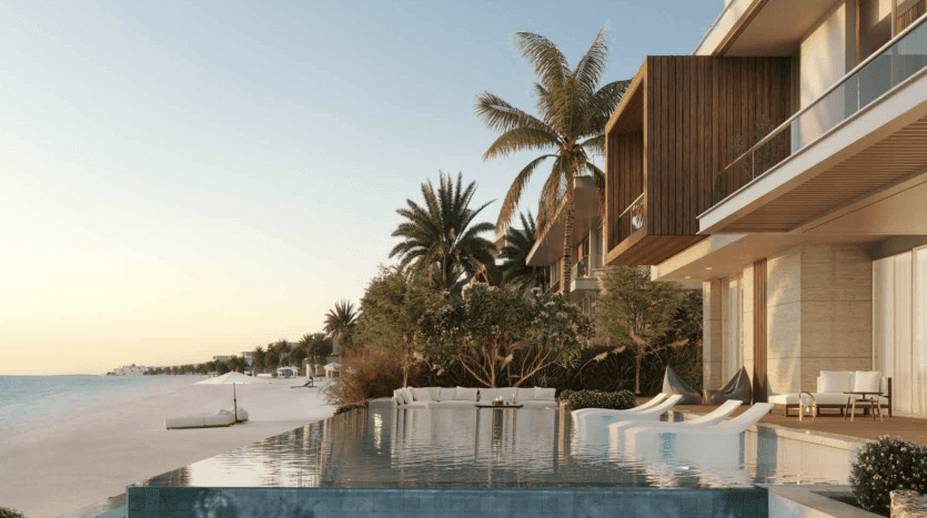 A luxurious beachfront villa in Dubai with a transparent outdoor pool overlooking the ocean, surrounded by lush palms and elegant outdoor furniture, during a tranquil sunset.