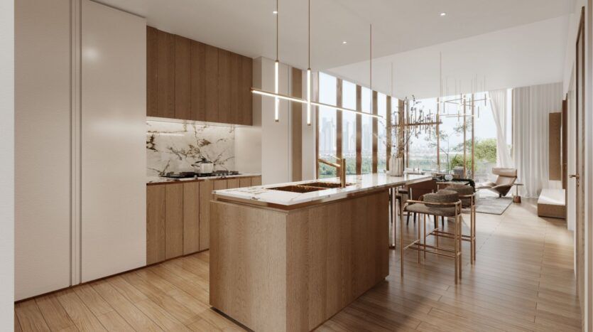 La cuisine et la salle à manger de Wynwood Horizon de Imtiaz sont modernes et ouvertes, avec des armoires en bois, un dosseret en marbre, un îlot avec un plan de travail, des lampes suspendues et de grandes fenêtres offrant une lumière naturelle. Décoration contemporaine et tons neutres dans tout l'appartement.