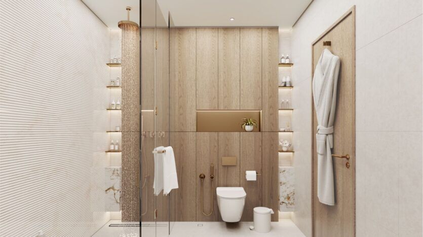 Salle de bains minimaliste à Wynwood Horizon de Imtiaz avec des murs en bois clair, des étagères encastrées pour les serviettes et les articles de toilette, des toilettes murales, une douche en verre et un peignoir sur une porte en bois. Une petite plante trône au-dessus des toilettes.