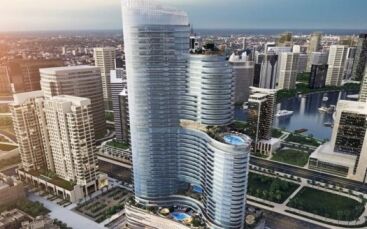 Le rendu artistique du complexe de gratte-ciel « Imperial Avenue » présente une conception moderne et curviligne avec plusieurs tours surplombant une rivière dans une zone urbaine densément peuplée. Le design présente des vagues
