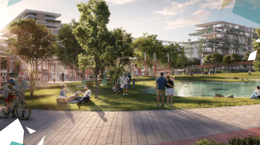 Digital rendering of a modern urban park with people relaxing and walking, modeled on Central Park. Features include a pond, green lawns, shaded paths and multi-storey residential buildings in the background.