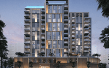 Villa résidentielle moderne à Dubaï éclairée au crépuscule, dotée d'une façade élégante avec une signalisation bien visible « Ellington Berkeley Place » et des balcons aux étages supérieurs.