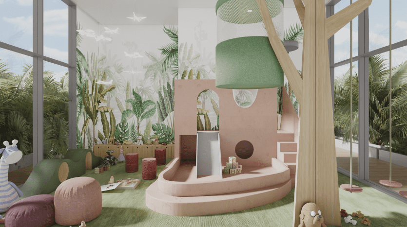 Salle de jeux pour enfants lumineuse et moderne dans un appartement à Dubaï comprenant une grande structure de jeu rose, des jouets en peluche et des plantes vertes, entourée de baies vitrées offrant une vue extérieure luxuriante.