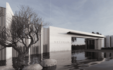 Conception architecturale moderne avec un bâtiment portant le nom « Keturah » sur sa façade, entouré d'eau, d'arbres dénudés et de grosses pierres, reflétant une esthétique tranquille et élégante dans une villa de premier ordre à Dubaï.