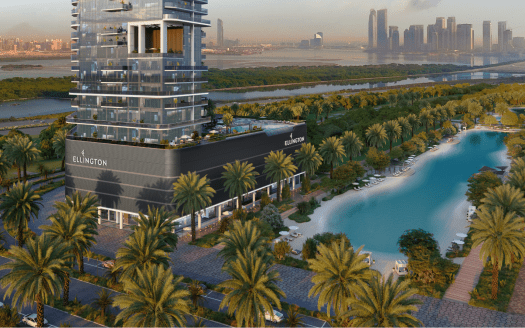Vue aérienne d'un bâtiment moderne au bord d'une rivière sinueuse avec des palmiers, surplombant les toits de la ville de Dubaï au coucher du soleil.