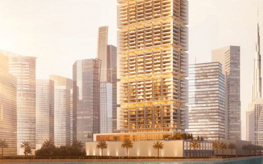 Un paysage urbain moderne composé d'un groupe d'immeubles de grande hauteur dotés d'extérieurs en verre réfléchissant. The One by Binghatti, un grand bâtiment au design unique avec des sections à plusieurs niveaux, se dresse bien en vue au premier plan près d'un plan d'eau, entouré de palmiers et adjacent à d'autres gratte-ciel.