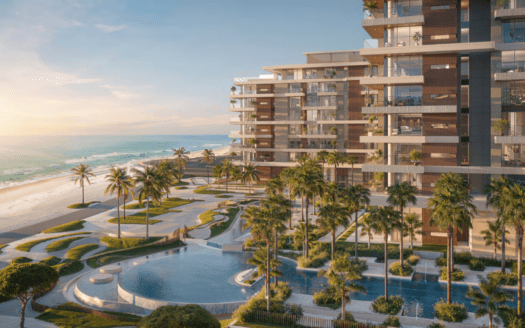 Al tramonto, il complesso di appartamenti sulla spiaggia di Ellington Cove è caratterizzato da alti edifici con balconi, una grande piscina e palme ondeggianti. La spiaggia sabbiosa e le onde dell'oceano creano uno sfondo pittoresco per questa oasi moderna.