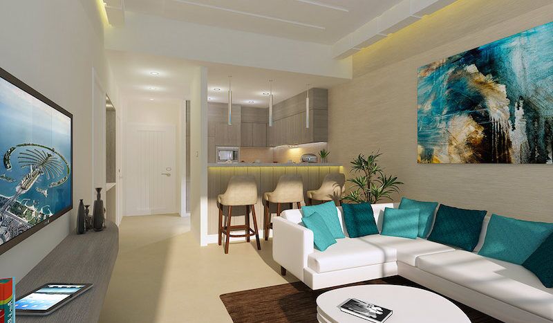Salon moderne comprenant un canapé sectionnel blanc, des coussins bleu sarcelle, une grande peinture abstraite bleue intitulée "Seven Palm" et une cuisine ouverte avec des tabourets de bar. Profitez de l'ambiance lumineuse et cosy accentuée par