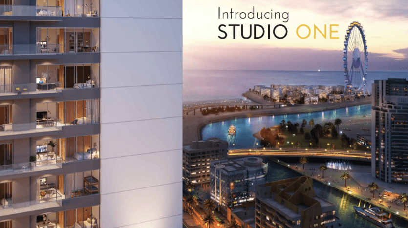 Image promotionnelle du Studio One Dubai Marina, représentant son architecture moderne avec une vue sur un paysage urbain animé au crépuscule, avec une grande roue au bord de l'eau.