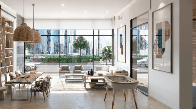 Intérieur d'appartement moderne avec un design ouvert comprenant un coin repas, un salon avec de grandes fenêtres vitrées offrant une vue sur la ville du Sloane JVC et une décoration chic et contemporaine.
