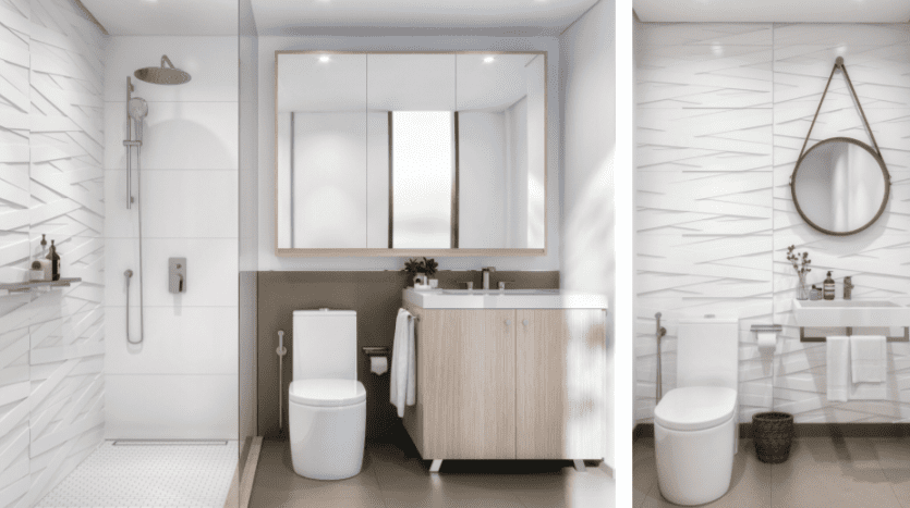 Une salle de bains moderne avec des carreaux blancs à chevrons, dotée d'une vasque en bois, d'une douche à l'italienne, de deux toilettes et de miroirs, éclairée par la lumière naturelle dans un appartement de Dubaï.