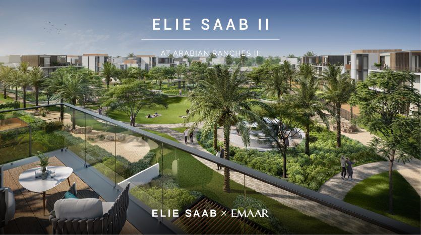 Un rendu architectural d'Elie Saab à Arabian Ranches III, montrant une vue d'un balcon donnant sur un parc verdoyant avec des palmiers et des villas contemporaines en arrière-plan.