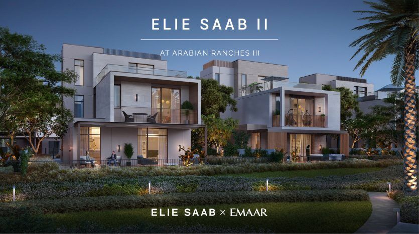 Un rendu architectural des villas de luxe modernes d'Elie Saab à Arabian Ranches III au crépuscule, avec un aménagement paysager élégant et des intérieurs éclairés.
