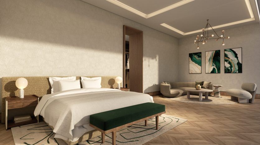 Une chambre luxueuse avec un grand lit, un banc vert, du parquet et un coin salon près d'une fenêtre. Un éclairage élégant à six sens et des œuvres d'art murales abstraites rehaussent l'ambiance moderne et chaleureuse.