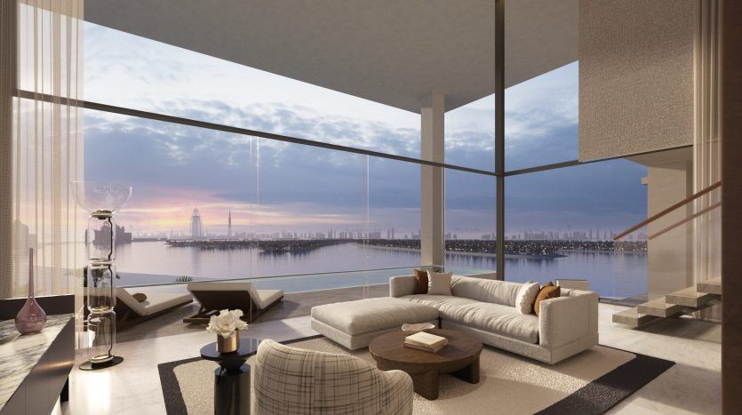 Salon luxueux avec une expérience des six sens sur les toits de la ville, doté d'une décoration moderne et d'un canapé sectionnel, accentué par un éclairage chaleureux et un mobilier élégant.