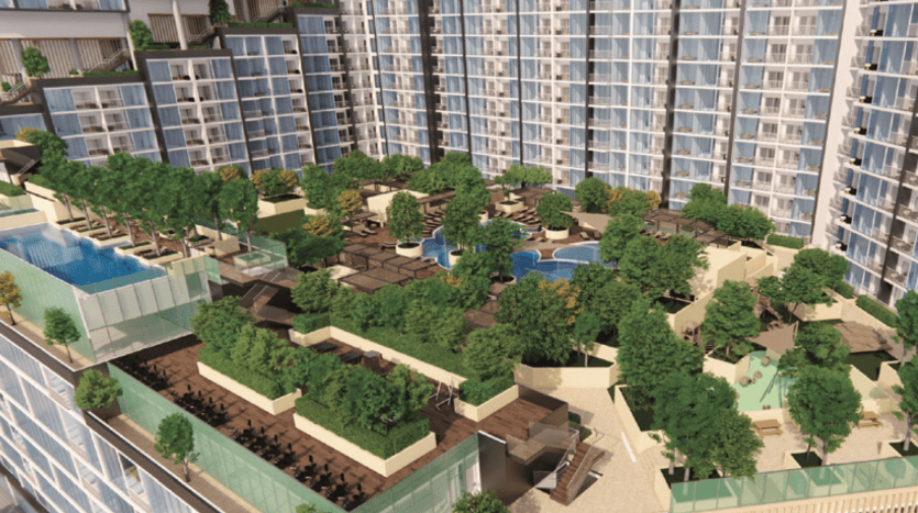 Vue aérienne de « The Crest Dubai », un complexe résidentiel moderne composé d'immeubles de grande hauteur, d'espaces verts luxuriants, d'arbres et de plusieurs piscines, entouré d'un cadre communautaire dynamique.