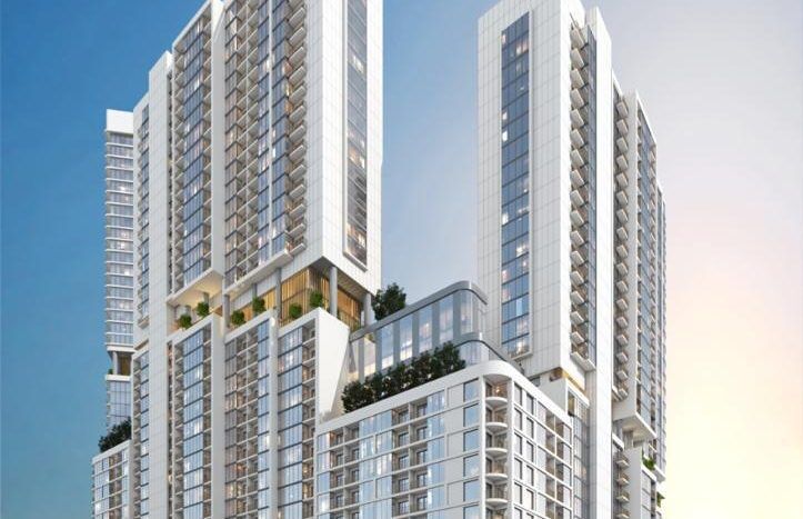 Rendu architectural de The Crest Dubai, un complexe résidentiel moderne à plusieurs tours avec des façades en verre, des balcons, des terrasses verdoyantes et un ciel de coucher de soleil vibrant.