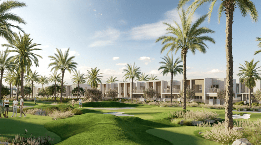 Une vue panoramique sur la vallée de Talia avec des palmiers, des gens jouant au golf et des villas contemporaines sous un ciel dégagé. Une verdure luxuriante et de petits plans d'eau rehaussent le paysage serein.