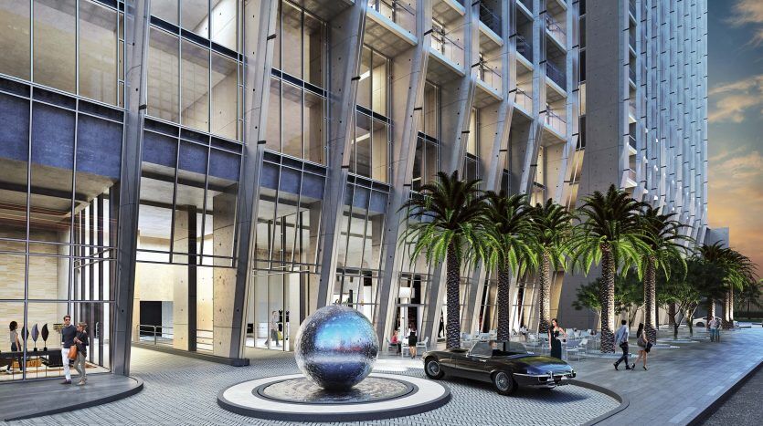 Image rendue du Sterling Dubai, un complexe moderne au design élégant comprenant de grands bâtiments, une sculpture sphérique brillante, des palmiers et des gens se promenant et conduisant une voiture classique.