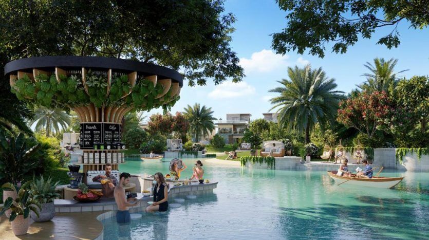 Une scène de villégiature présentant une piscine entourée de plantes tropicales luxuriantes, avec des gens se relaxant sur des sièges de bar immergés et une personne ramant sur un petit bateau à Dubaï.