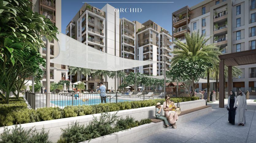 Rendu architectural d'une orchidée de plage de ruisseau par emaar avec des gens marchant tranquillement et assis près d'une piscine centrale entourée de bâtiments résidentiels modernes à Dubaï.
