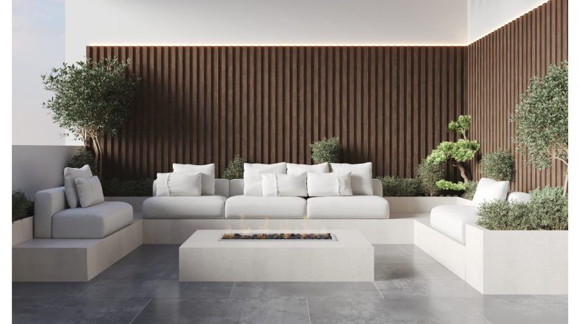 Salon moderne et minimaliste avec canapés blancs intégrés, cheminée centrale vitrée, mur à lattes en bois et plantes d'intérieur. Le texte indique "Maisons multidimensionnelles de 4 chambres" par Mag Park, un investissement idéal