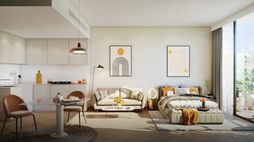 Appartement décloisonné moderne et ensoleillé à Dubaï avec un salon confortable, une cuisine minimaliste et un accès au balcon. Décoration lumineuse, lignes épurées et atmosphère sereine.