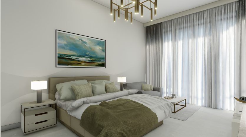 Une chambre moderne dans une villa de Dubaï avec un grand lit recouvert d'une literie verte et beige, flanqué de deux lampes sur des tables de nuit, sous un grand tableau de paysage marin encadré, avec des rideaux transparents au-dessus de grandes