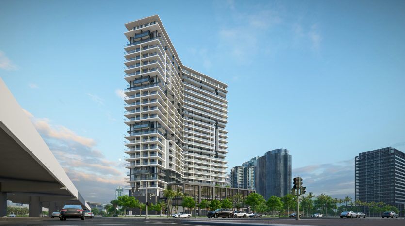 Immeuble résidentiel moderne de grande hauteur avec une conception architecturale unique à plusieurs niveaux, situé dans une rue animée avec des voitures qui passent dans un cadre urbain de Dubaï.