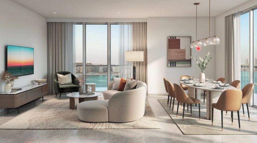 A modern living room in a Dubai villa with a sitting area, dining table, large windows offering water views and natural light filling the space.