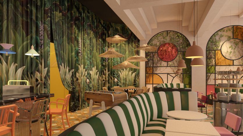 Un intérieur de café vibrant et éclectique avec des banquettes à rayures vertes, une variété de chaises colorées et des murs sur le thème tropical avec une verdure luxuriante et des motifs floraux. Les lampes suspendues en osier ajoutent une ambiance chaleureuse rappelant un
