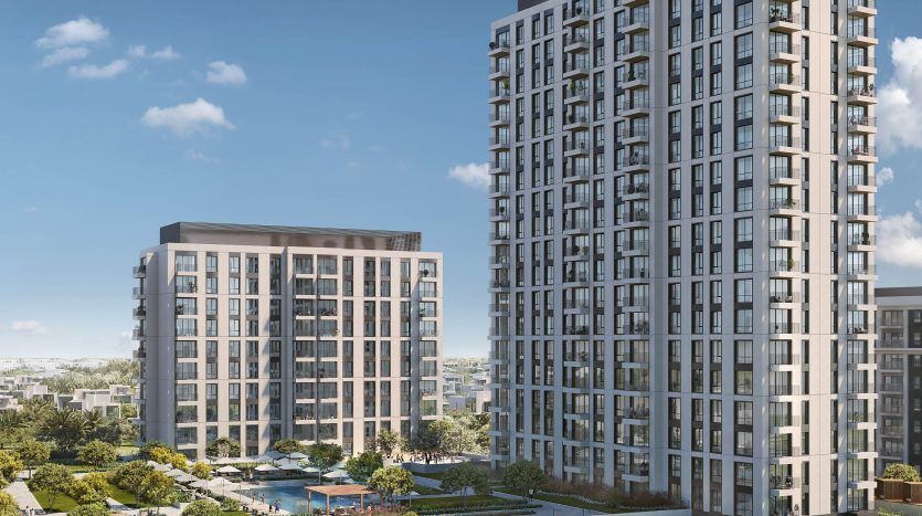 Rendu numérique de l'horizon du parc, Dubai Hills Estate, montrant des immeubles résidentiels modernes de grande hauteur représentés par une agenceimmobilière Dubaï, entourés d'un aménagement paysager verdoyant et de palmiers sous un ciel bleu clair.