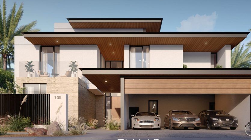 Maison moderne à deux étages à Dubaï avec de grandes fenêtres, un toit plat et un garage pour trois voitures. Une femme à vélo se trouve dans l’allée, entourée d’un paysage luxuriant.