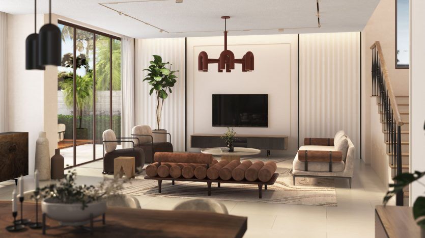 Salon moderne avec des meubles élégants, une grande télévision et des plantes d'intérieur à Dubaï. La lumière naturelle rehausse l’ambiance chaleureuse et spacieuse.